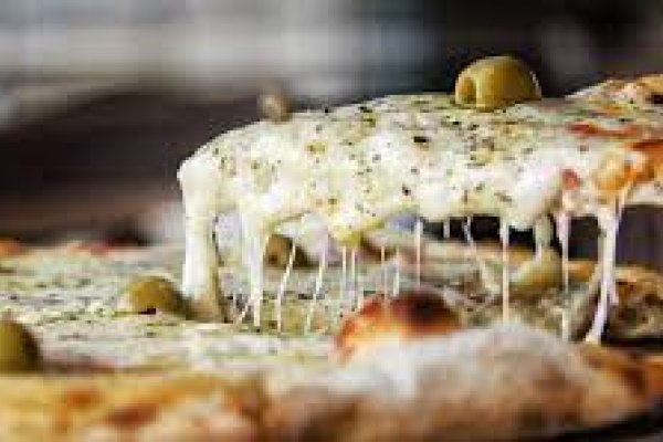 Hoy noche de la pizza y la empanada en todo el país